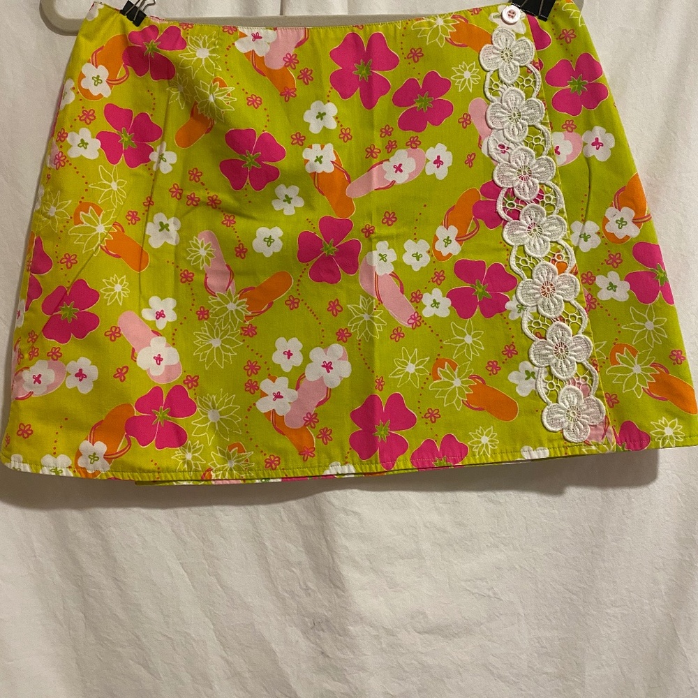 Lilly Pulitzer reversible wrap mini skirt, flip flops and mosaic sun prints size